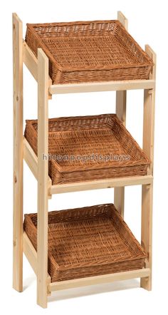 three tiered wooden shelf with wicker baskets on each shelf for storage or display