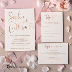 the wedding stationery is laid out on top of pink petals and seashells