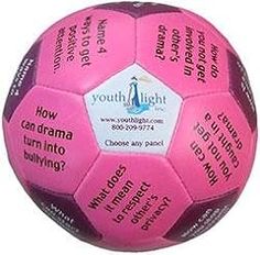 a pink soccer ball with the words youth light written on it's side,