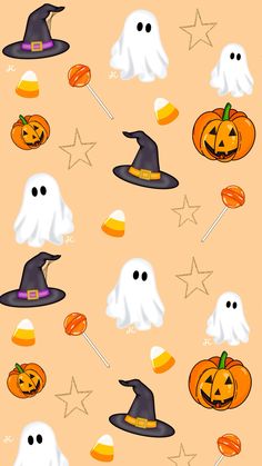 halloween wallpaper with ghost, pumpkins and candies on an orange back ground