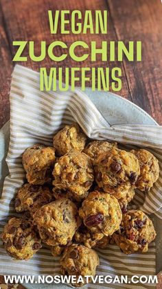 vegan zucchini muffins are piled on top of each other with text overlay