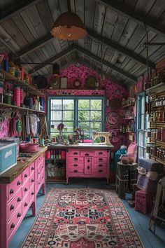 a room filled with lots of pink furniture