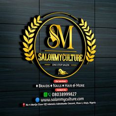 salonmycluture logo on the side of a building with gold laurels