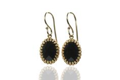 With two Black Onyx stones incorporated in a customizable setting, these black statement earrings will be your new favorite jewelry pieces. These drop earrings creations are timeless, classy, and will elegantly go with a formal or casual ensemble. Handmade by artisans. You can choose the finish for the earrings. Perfect gift for a lady. Elegant for special occasions. Comes in a novelty box. Product specifications Jewelry Information Metal stamp 14K Metal Gold Filled Gem Type Onyx Setting Prongs Black Statement Earrings, Classic Jewelry Pieces, Black Onyx Earrings, Black Onyx Stone, Onyx Earrings, Silver Dangle Earrings, Earrings In Gold, Classic Jewelry, Onyx Stone