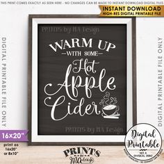 a black and white sign that says warm up with some hot apple cider on it