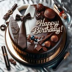 a birthday cake with chocolate decorations on it