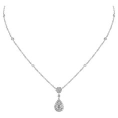 A timeless pendant that is set with round and marquise cut diamonds demonstrating the exceptional quality, this multi-cut diamond pendant is an elegant design that is perfect for both daywear and eveningwear, suspended from a fine 18 karat white gold chain. 18 Karat White Gold Diamond (Total Carat Weight: 1 ct) Color and clarity: F, VVS Weight: 5.31 g Pendant size: 43 cm White Gold Pendant, Diamond Jewelry Designs, White Gold Chains, Marquise Cut Diamond, Marquise Cut, Drop Necklace, White Gold Diamonds, Diamond Pendant, Gold Pendant