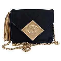 Beautiful vintage mini bag in black satin with gold detailing. Overall in good vintage condition still. Series #1. Comes as is with the holo intact. Minor marks on the satin surface. Handbag Aesthetic, Dior New Look, Gucci Runway, Satin Quilt, Vintage Chanel Bag, Chanel Jumbo, Satin Noir, Chanel Vintage, Gold Sunglasses