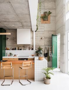 the kitchen is clean and ready to be used as a dining room or office space