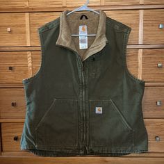 Collar Up Or Collar Down, This Gorgeous Green Vtg Carhartt Women’s Mock Neck Sherpa Lined Vest Is Awesomely Faded And Broken In! This Looker Is Perfect For Workwear, Streetwear, Leisure Or Any And All Of Your Adventures! Two Interior And 3 Exterior Pockets To Keep Your Necessary Items Very Close! This Vest Was Meant For Hard Word And Dedicated Play! Lined In Warm, Snugly Sherpa, This Vest Is Great For Layering. Euc Steam Sanitized For Your Peace Of Mind. Carhartt Vest, Granola Style, Carhartt Jackets, Carhartt Womens, Carhartt Women, Vintage Vest, Sherpa Lined, Mock Neck, Work Wear