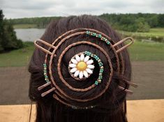 Large Hair Bun Holder with 2 Fork Sticks-handmade & unique-strong and sturdy-made of solid copper metal-fun spiral design with a pretty daisy flower in the center along with turquoise glass beading for a fresh look-works as a nice cover for a bun to dress it up!-this bun cover comes with two strong stick forks. Use just one or both to secure your bun for different looks.-Please note: Everyone's hair is different. Although this bun cover pin holds in the model's hair very well you may have to Hair Bun Accessories Jewelry, Hollow Hair Rings, Whimsical Handmade Adjustable Hair Accessories, Red Hair Slides With Sticks, Metal Hair Bun Cage, Hair Bun Cover, Long Hair Clip, Celtic Hair, Hair Clasp