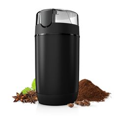 a black coffee grinder surrounded by spices