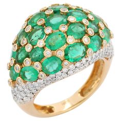 Diamond and Emerald Statement Ring Set in 18K Gold featuring natural emerald of 5.32 carats and diamonds of 1.51 carats. The gorgeous handcrafted ring goes with every style. Emerald enhances intellectual capacity of the person. Designed with oval cut emerald and diamond cluster studded on dome that makes it a perfect fit to wear it on your wedding or style it with any of your basic outfit to give it a glam. This is a perfect ring for anniversary gifts or engagement gifts or wedding gifts for any Emerald Statement Ring, Dome Rings, Gold Galaxy, Gold Ear Jacket, Galaxy Ring, Rosecut Diamond Ring, Ear Jacket Earring, Emerald Diamond Ring, Gold Gemstone Ring