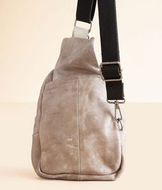 Bed Stu Beau Leather Sling Backpack - Grey , Women's Iciclerusticnectar Distressed leather fabric lined backpack Zipper and hook closures Interior zipper and pouch pockets Adjustable shoulder strap Dimensions: 8(L) x 2 1/2(W) x 13(H). Due to the nature of leather/suede, small variances of color in the skin may occur, this is in no way considered a defect. These are inherent characteristics of leather/suede and will enhance the individual look of your garment.. Genuine leather. Apparel & Accessor Woman Sling Bag, Bed Stu Bags, Backpack For Women, Leather Sling Bag, Bed Stu, Distressed Leather, Leather Fabric, Sling Bag, Sling Backpack