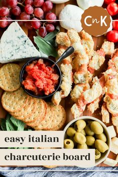 an assortment of cheeses, crackers and olives on a platter with the words easy italian charcuterie board