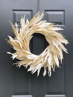 a close up of a door with a wreath on it