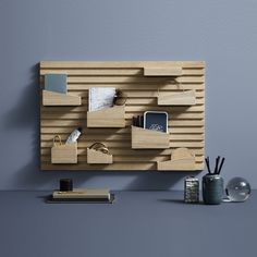 a wooden shelf that has various items on it