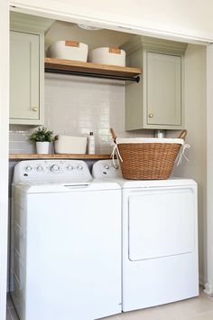 a washer and dryer in a small room