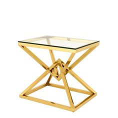 a gold metal and glass side table with an x design on the top, against a white background