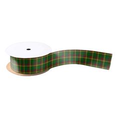 a roll of green and red plaid ribbon