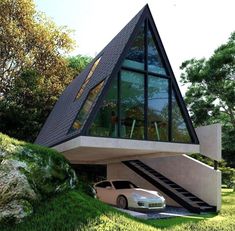 two cars are parked in front of a triangular shaped house with stairs leading up to the roof