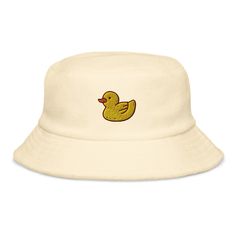 a white hat with a yellow rubber duck on it