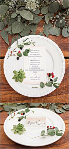 the table is set with white plates and greenery on it, along with place cards