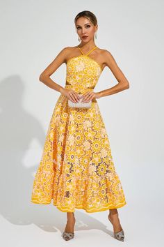 Chic Halter Neck Midi Dress For Summer Parties, Yellow Sleeveless Halter Dress For Summer, Elegant Yellow Summer Maxi Dress, Yellow Sleeveless Halter Sundress, Yellow Halter Sundress For Beach, Yellow Sundress Halter Dress For Beach, Yellow Beach Sundress Halter Dress, Yellow Spaghetti Strap Beachwear Dress, Elegant Yellow Halter Neck Dress