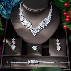 Elegant 4-Piece White Cubic Zircon Wedding Jewelry Set
 
 This exquisite wedding jewelry set offers a touch of glamour and sophistication to your special day. Crafted with attention to detail Bride Jewelry Set, Necklace Set Indian, Bridal Necklace Set, Bride Accessories, Women's Jewelry Sets, Wedding Bridal Jewellery, Crystal Accessories, Bridal Bracelet, Bride Jewellery