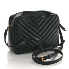 This is an authentic SAINT LAURENT Calfskin Matelasse Monogram Lou Camera Bag in Black. This chic shoulder bag is crafted of chevron-quilted calfskin leather in black. It features an adjustable crossbody strap with a removable tassel and aged gold hardware including a prominent YSL monogram detail on the front. The top zipper opens to a compact black fabric interior with a patch pocket. Crossbody Strap, Black Fabric, Gold Hardware, Patch Pocket, Camera Bag, Calf Skin, Saint Laurent, Monogram, Shoulder Bag