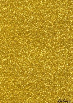 an airplane is flying in the sky with gold glitter