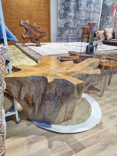 a table made out of wood on top of a hard wood floor in a store