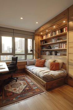 a living room filled with furniture and bookshelves next to a large window on top of a hard wood floor