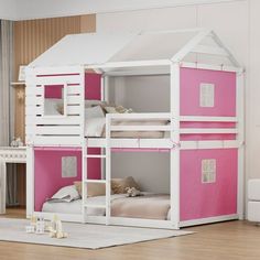 a pink and white bunk bed in a child's room