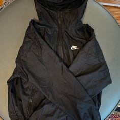 Lack Nike Windbreaker Men’s Size Large Never Worn Great Condition, Fits Like A M/L Need Gone!! Let Me Know Nike Black Techwear Windbreaker, Nike Urban Black Outerwear, Nike Black Outerwear For Streetwear, Nike Black Techwear Outerwear, Black Nike Windbreaker With Pockets, Nike Black Windbreaker With Pockets, Nike Black Track Jacket With Pockets, Nike Black Outdoor Sport Coat, Casual Black Nike Sport Coat