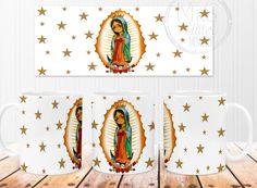 two coffee mugs with the image of our lady of guadalupe on one side and gold stars on the other