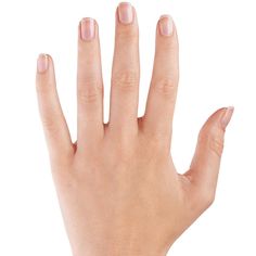 a woman's hand with pink nail polish on it and a ring around her finger