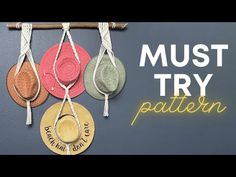 three medals hanging on a wall with the words must try pattern