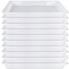 a stack of white plastic dishes on a white background with no people in the photo