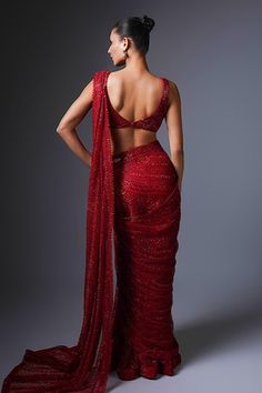 Red lehenga saree with crystal, bugle bead, thread embroidery in geometric pattern. Paired with cutwork embroidered blouse. - Aza Fashions Red Draped Lehenga For Festive Occasions, Red Draped Lehenga For Diwali, Red Draped Designer Choli, Red Draped Lehenga With Zari Work, Red Pre-draped Saree With Cutdana, Red Draped Lehenga For Party, Red Cutdana Pre-draped Fitted Saree, Red Fitted Pre-draped Saree With Cutdana, Fitted Red Pre-draped Saree With Cutdana