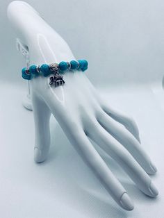 Turquoise Evil Eye bead bracelet for luck and protection Good Luck Adjustable Beaded Bracelets With Natural Stones, Adjustable Gemstone Beads Bracelets For Good Luck, Turquoise Beaded Bangle Bracelet Gift, Turquoise Beaded Bangle Bracelet For Gift, Turquoise Bangle Beaded Bracelet For Gift, Spiritual Turquoise Beaded Bracelets With Polished Beads, Turquoise Symbolic Adjustable Jewelry, Spiritual Turquoise Bracelets With Polished Beads, Spiritual Turquoise Beaded Hypoallergenic Bracelet