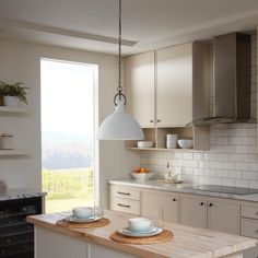 the kitchen is clean and ready to be used for breakfast or dinner time, with no one in it