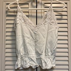 Size Small. Never Worn. Cute With Jeans, Leggings Or A Short Skirt Cotton Camisole Bottoms For Summer, Spring Cotton Cami Bottoms, Cotton Crop Top With Lace Trim For Day Out, Cotton Lace Trim Crop Top For Day Out, Summer Cotton Crop Top With Lace Trim, Casual Lace Trim Crop Top For Summer, Casual Spaghetti Strap Crop Top With Lace Trim, Forever 21 Cotton Tank Top For Vacation, Forever 21 Cotton Tank Top For Beach