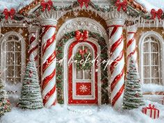 a gingerbread house decorated for christmas with candy canes