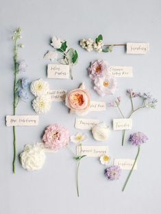 flowers and name tags laid out on a table