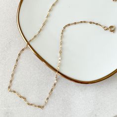 Kris Choker Necklace-Necklaces-The Songbird Collection Gold Plated Delicate Chain Necklace, Delicate Gold-plated Chain Necklace, Minimalist Tarnish Resistant Link Charm Necklace, Delicate Gold Plated Clavicle Chain Necklace, Delicate Gold Plated Collar Length Chain Necklace, Dainty Gold Plated Choker, Dainty 14k Gold Necklace With Delicate Chain, Dainty Rose Gold Plated Chain Necklace, Dainty Rose Gold-plated Chain Necklace