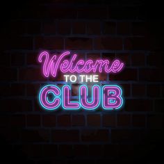 neon welcome to the club sign on a brick wall