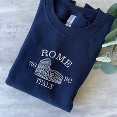 Embroidered Rome Sweatshirt, Italy Sweatshirt, Rome Italy Crewneck Sweatshirt, Italy Sweatshirt, colosseum Sweatshirt We offer a variety of custom made embroidery apparel.   See photos above for size and color options.   Our crewneck sweatshirts and hoodies come in  size S - 2XL. Please choose from the dropdown menu what size and color you'd like.  In the notes at checkout, please let me know the thread colors you'd like on your clothing, otherwise, it will be made like the photo.  Visit the res Embroidery Apparel, Navy Crewneck, Italy Vintage, Embroidery On Clothes, Sweatshirts And Hoodies, Embroidered Clothes, 3d T Shirts, Rome Italy, Embroidered Sweatshirts