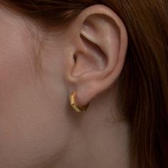 Our Hexagon Huggie Earrings are the perfect way to add a little sparkle and edge to any look! These handcrafted 14K Solid Gold earrings come in three chic colors: rose gold, silver, and gold. Whether you're going for an edgy or classic look, these rings will always keep you at the top of your game. The eye-catching hexagon shapes give your outfit a fresh twist and are perfect for layering with other accessories. Plus, they're made from only the highest quality materials like 8K Solid Gold, 10K S Hexagon Hoop Earrings, Gold Octagon Hoop Earrings As Gift, Elegant Octagon Hoop Earrings As Gift, Minimalist Octagon Jewelry For Everyday, Minimalist Everyday Octagon Jewelry, Modern Hexagon Everyday Jewelry, Modern Octagon Hoop Earrings For Gift, Modern Octagon Hoop Earrings As Gift, Modern Octagon Hoop Earrings