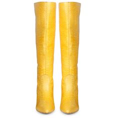 The Saint Adella yellow leather boot is a luxury that cleverly combines a stylish youthful outlook. These knee high boots have a emobssed leather upper and a pointed toe to add a touch of style to your everyday look. Made from the finest materials. Features a covered stiletto heel, stitching details with paneled finish. complete with leather & fleece lining, padded leather footbed with stamped logo. the gorgeous boot sit on a 2.9 inches stiletto heel. The approx. height of the boot is-18.5 Inche Yellow High Heel Boots For Fall, Yellow Leather Boots For Fall, Chic Yellow Boots For Fall, Yellow Leather Boots With Snip Toe, Yellow Pointed Toe Party Boots, Yellow Pointed Toe Boots For Party, Yellow High Heel Leather Boots, Fitted Yellow High Heel Boots, Yellow Leather Boots With Pointed Toe